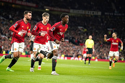 Man United's players celebrate team's first goal